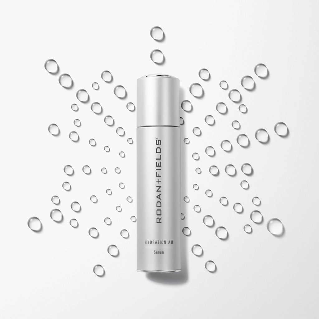 Rodan and Fields Active Hydration Serum shown against background pattern of droplets