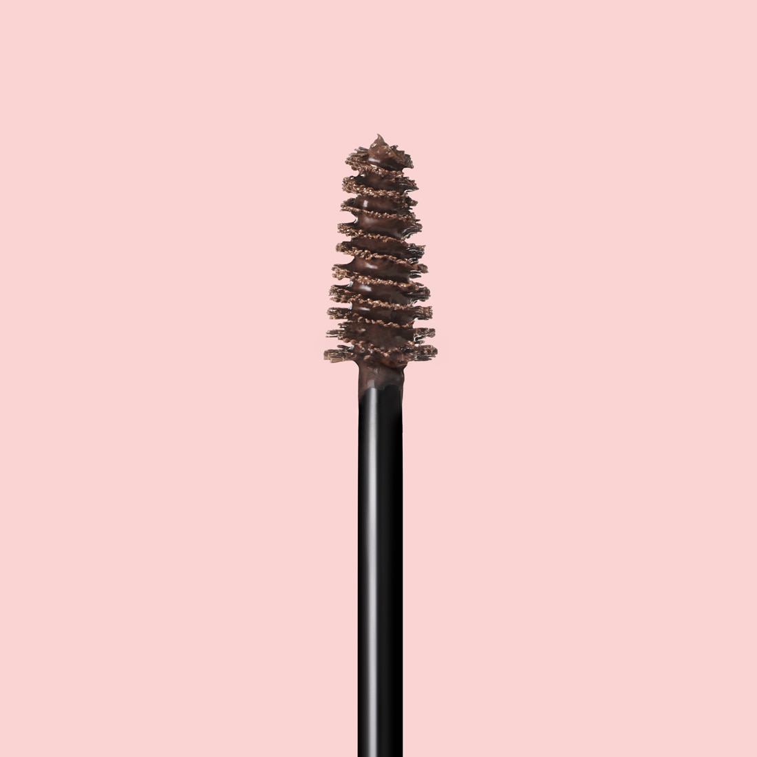 Close up of eyebrow tint applicator brush