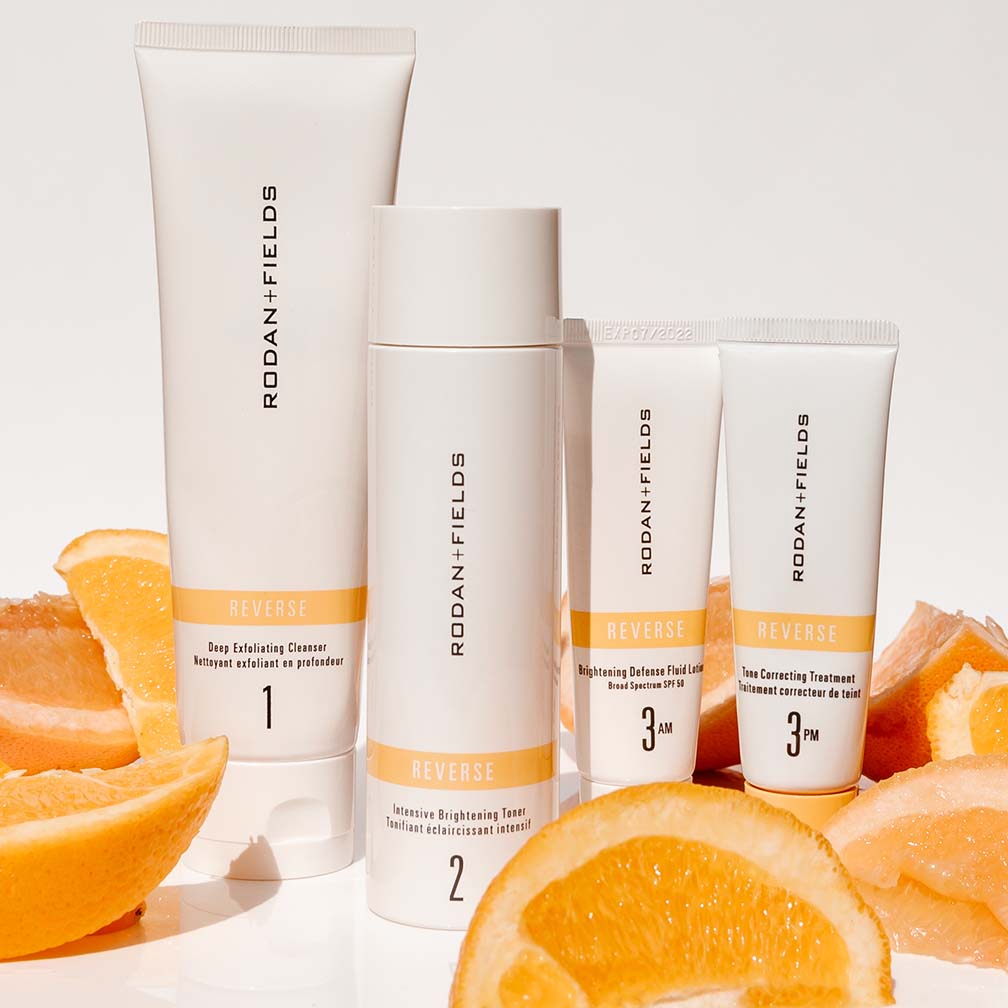 Rodan and Fields Reverse Regimen pictured with oranges